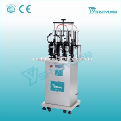 China Waimaotong Guangzhou Shangyu automatic glass bottle vacuum system perfume filling machine