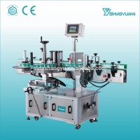 Factory hot sale fully automatic linear labeling machine for round or flat bottle self adhesive in china